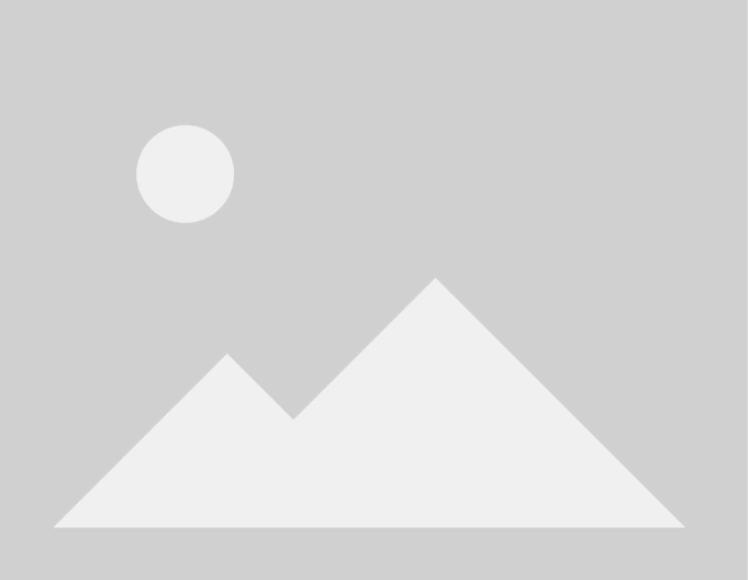 Ein großes, leuchtendes Prozentzeichen auf dunklem Hintergrund. Symbolisiert möglicherweise Rabatte oder Sonderangebote.